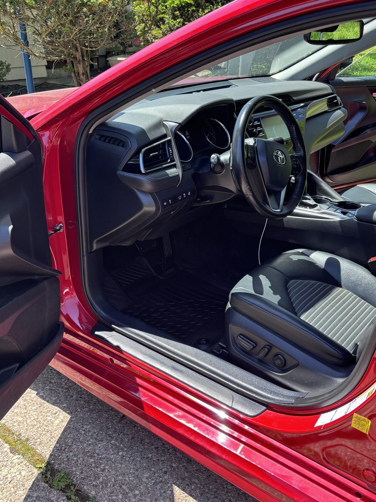 After detailing: spotless driver's seat, door sill and floor mat cleaned by Buffalo Diamond Detailing