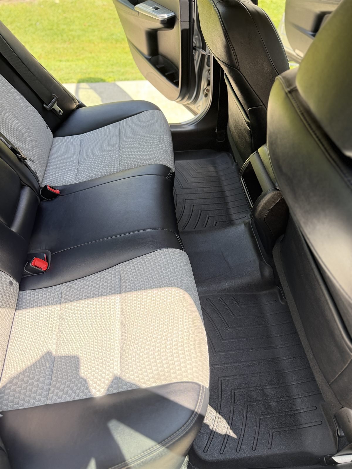 After detailing: clean rear seats and floor mats cleaned by Buffalo Diamond Detailing