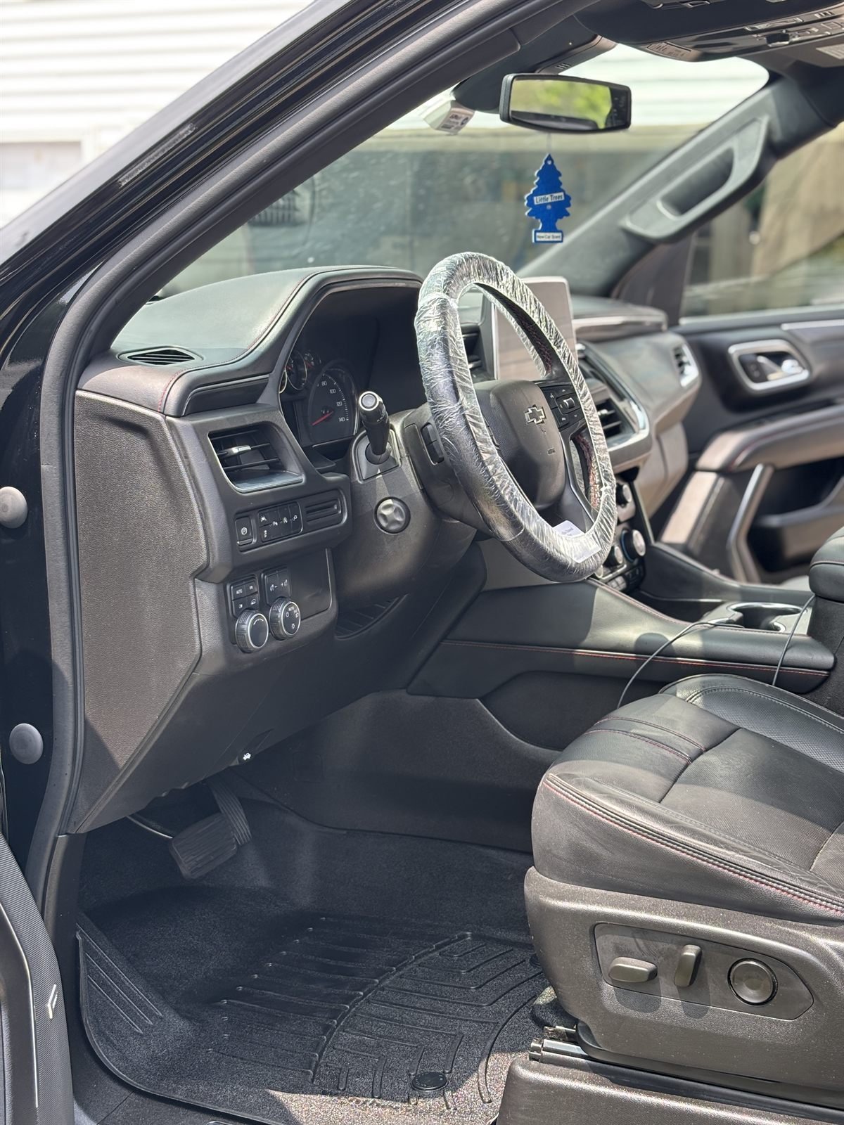 After detailing: clean driver-side interior and door sill cleaned by Buffalo Diamond Detailing