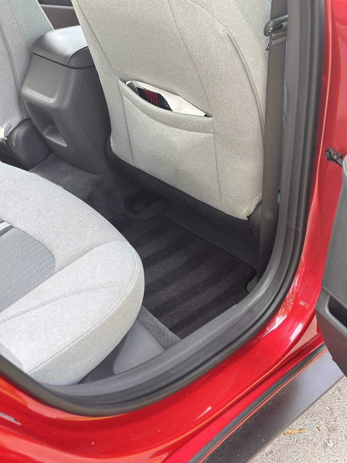 Rear seats folded and cleaned in a detailed SUV