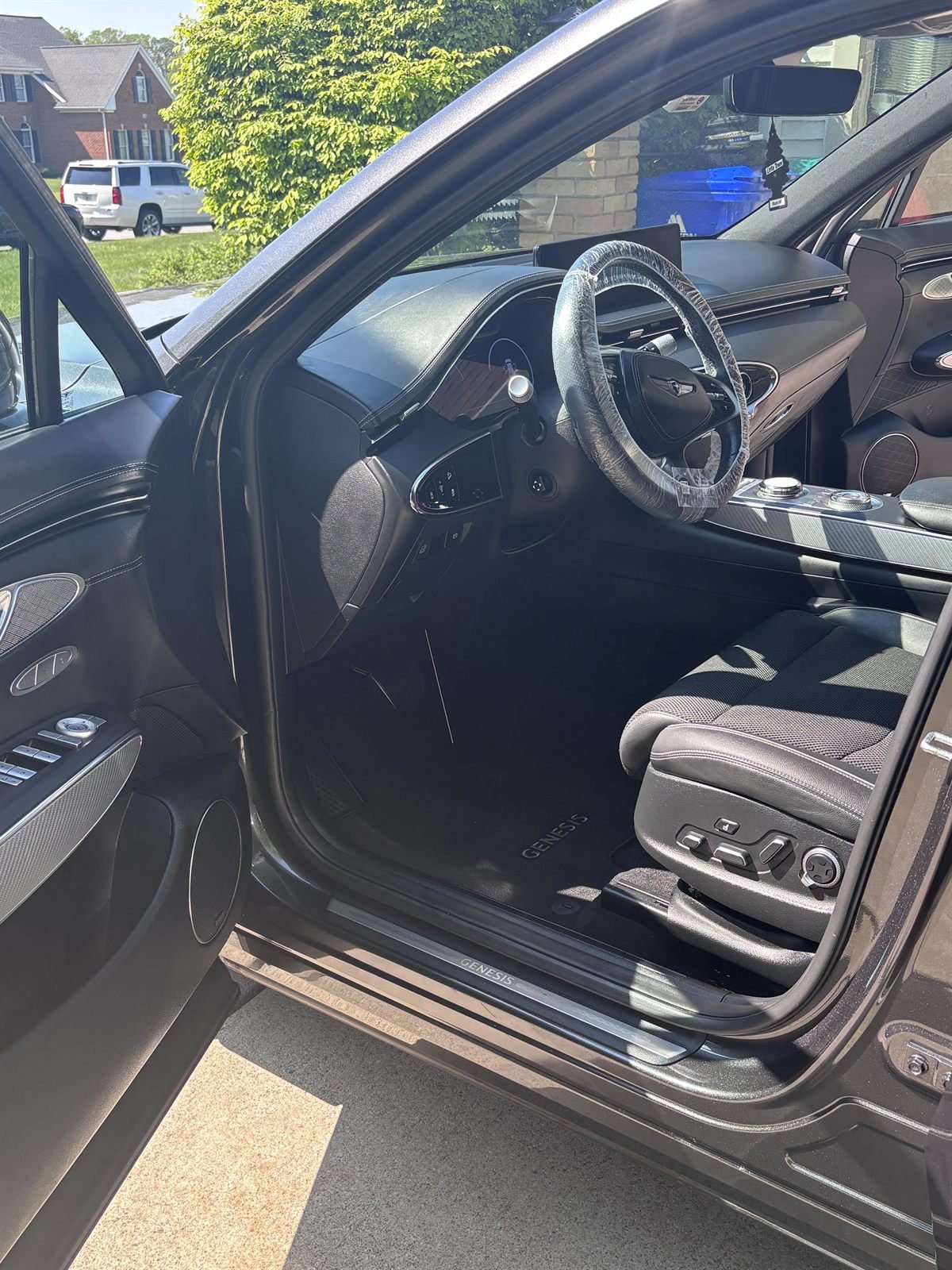 Detailed sedan interior &mdash; dashboard, console and front seats