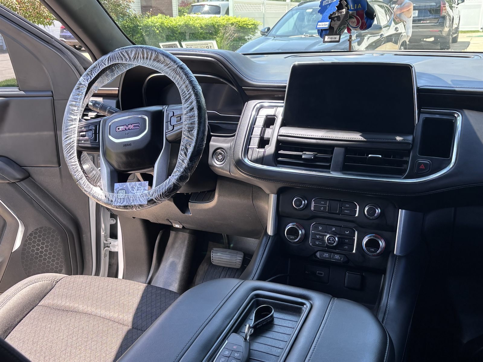 Truck cabin detailed &mdash; dashboard, center console and steering wheel cleaned