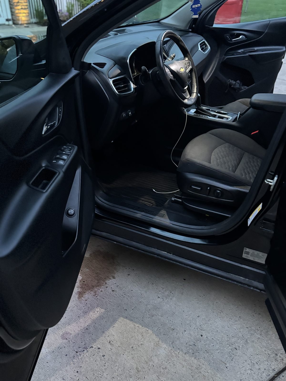 Detailed driver-side interior of a sedan &mdash; seat, dash and door