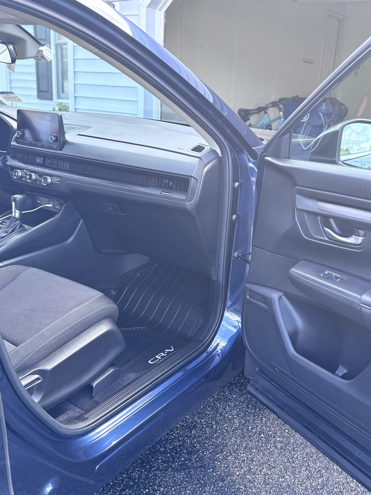 Passenger-side interior of a Honda SUV cleaned and protected