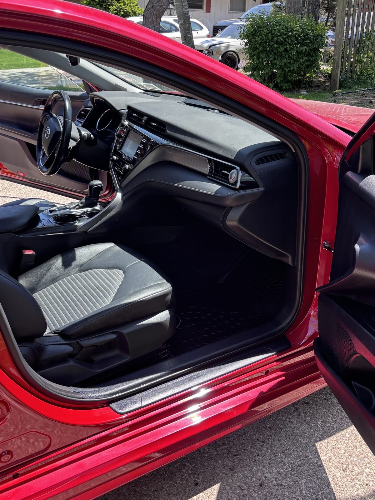 Detailed passenger-side interior of a red sedan